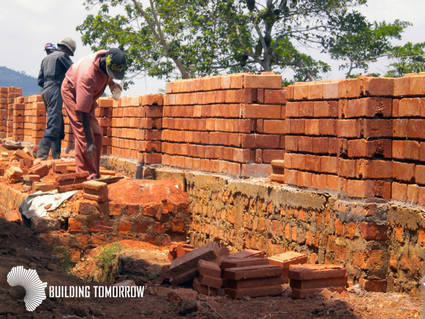 Walls are going up on the last of three classroom blocks at the BT Academy of Bubeezi, supported by the Engage Network.
