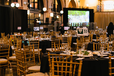 Before the event, the tables are set in the Grand Hall