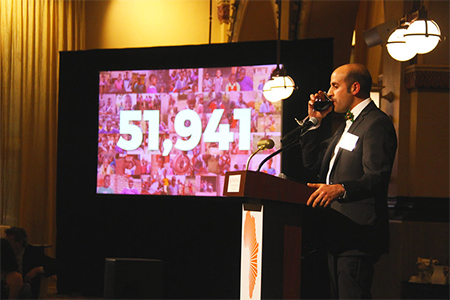 BT Founder & Chief Dreamer George Srour drinks a toast to enrolling 51,941 out-of-school children