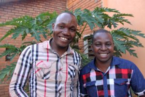 Cohort 2 Fellows Ibrahim Okello (left) and Michael Kamba (right)—founders of the Junior Farmer Fields initiative